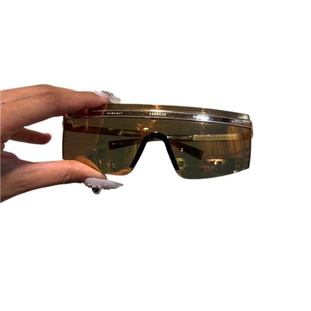 Gold Versace sunglasses with dust cloth and case